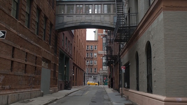Video Reference: alley, town, infrastructure, street, lane, building, neighbourhood, road, city, urban area