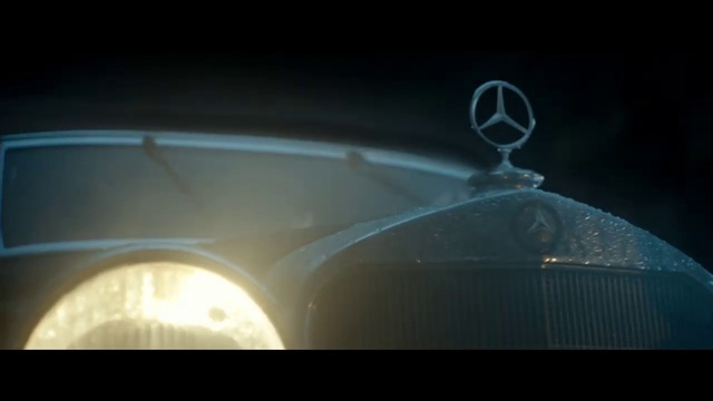 Video Reference: Light, Automotive lighting, Vehicle door, Automotive design, Vehicle, Auto part, Headlamp, Automotive exterior, Car, Personal luxury car, Sitting, Looking, Red, Dark, Food, View, Mirror, Black, White, Man, Screenshot, Land vehicle