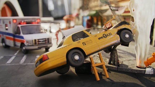 Video Reference: car, vehicle, motor vehicle, automotive design, play vehicle, automotive exterior, scale model, model car, taxi, Person