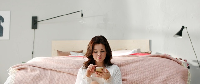 Video Reference: room, furniture, shoulder, girl, textile, bed, neck, product, interior design, floor, Person