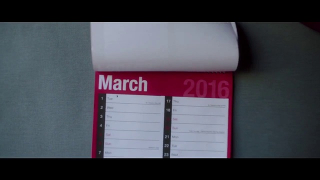 Video Reference: Text, Red, Font, Material property, Magenta, Label, Paper, Rectangle, Paper product, Brand, Person