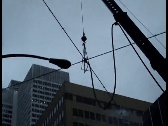 Video Reference: sky, mode of transport, traffic light, technology, electricity, building, light fixture, electrical supply, signaling device, lighting, Person