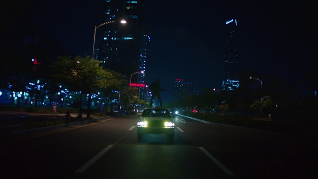 Video Reference: Night, Metropolitan area, Black, Darkness, Street light, Light, Road, City, Lighting, Lane