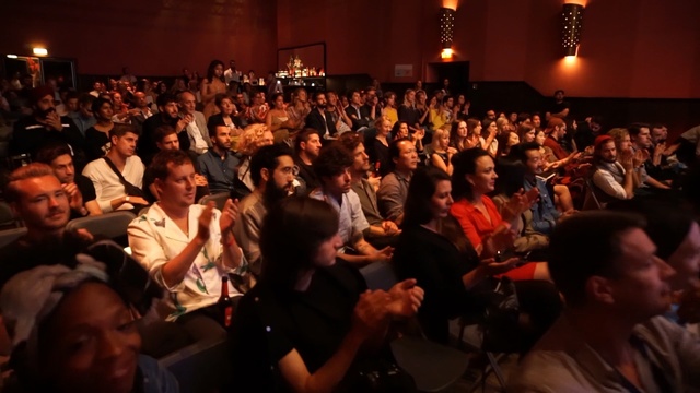 Video Reference: audience, crowd, convention, auditorium, applause, academic conference, event