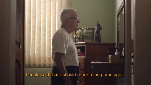 Video Reference: standing, window, furniture, communication, house, interior design, conversation, Person