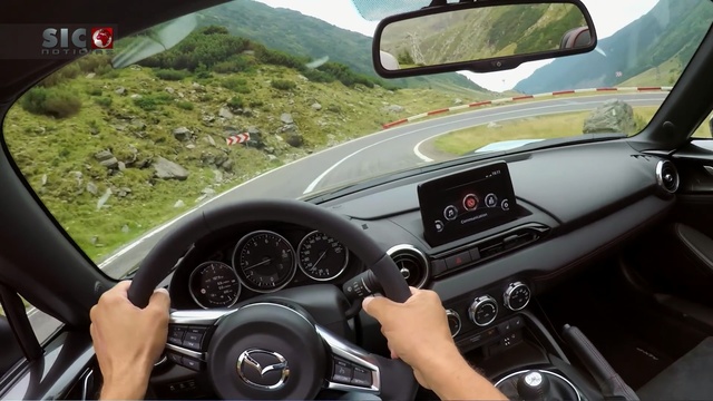 Video Reference: car, motor vehicle, land vehicle, vehicle, steering wheel, automotive design, steering part, personal luxury car, mazda, automotive exterior