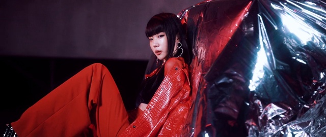 Video Reference: Red, Black hair, Fashion, Outerwear, Latex clothing, Long hair, Performance, Stage, Costume, Cg artwork