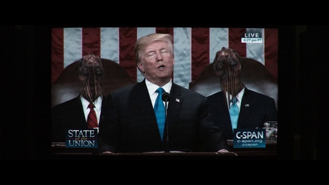 Video Reference: Official, News, Suit, Photo caption, Formal wear, Speech, Media, Event, Advertising, Television