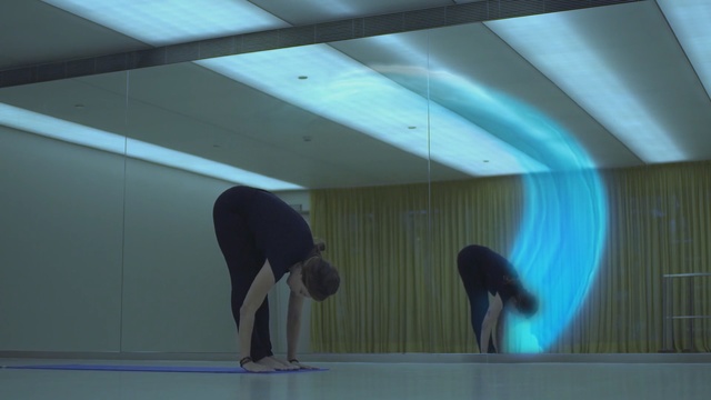 Video Reference: blue, light, lighting, ceiling, daylighting, sport venue, angle, physical fitness, floor, space, Person