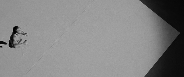 Video Reference: Rectangle, Sleeve, Grey, Font, Tints and shades, Pattern, Wood, Circle, Space, Flooring