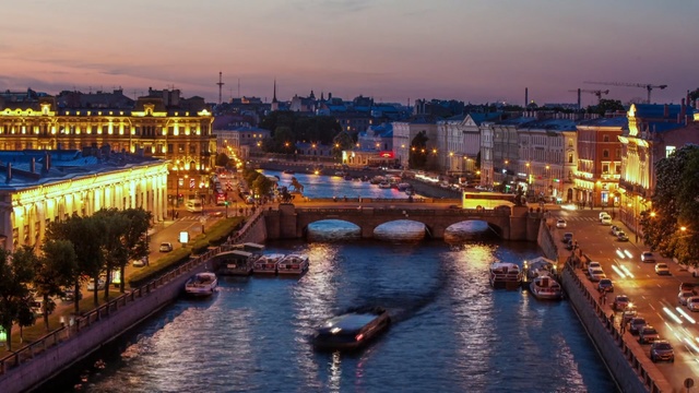 Video Reference: waterway, city, body of water, water, cityscape, night, river, sky, urban area, evening, Person