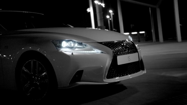 Video Reference: car, white, black, motor vehicle, vehicle, automotive design, family car, luxury vehicle, light, automotive lighting, Person