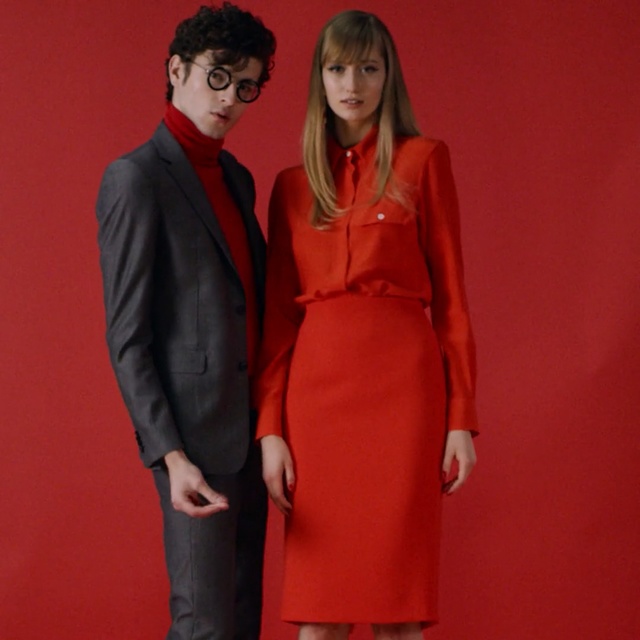 Video Reference: red, formal wear, dress, fashion model, fashion, suit, outerwear, flooring, girl, fashion design, Person