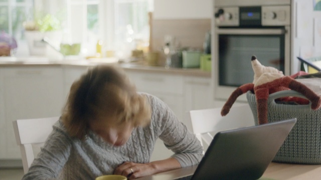 Video Reference: Room, Child, Furniture, Desk, Floor, Play, Electronic device, Flooring, Table, Toddler, Person