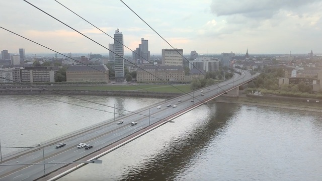 Video Reference: bridge, river, skyline, suspension bridge, city, fixed link, water resources, cable stayed bridge, metropolitan area, extradosed bridge