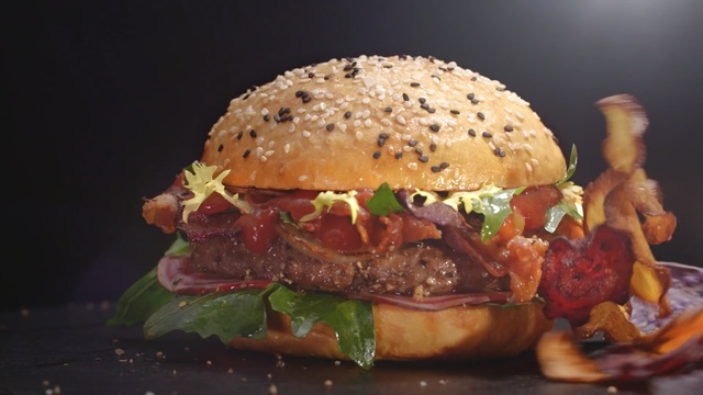 Video Reference: hamburger, veggie burger, fast food, sandwich, food, buffalo burger, dish, cheeseburger, junk food, salmon burger