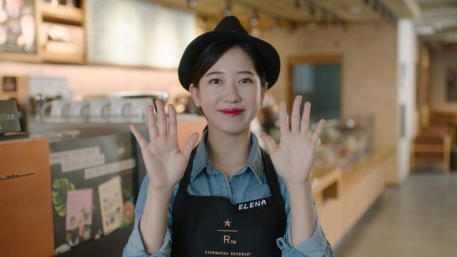 Video Reference: Skin, Beauty, Lip, Headgear, Hand, Smile, Photography, Gesture, Fashion accessory, Hat