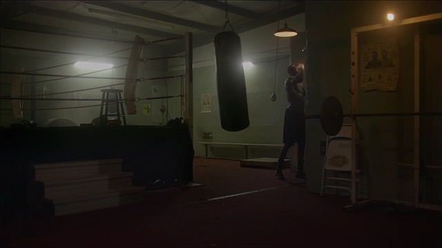 Video Reference: punching bag, game equipment, equipment, room, interior