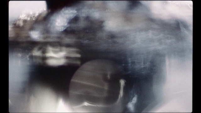 Video Reference: Photograph, X-ray, Nose, Radiography, Eye, Organ, Jaw, Mouth, Radiology, Photography, Monitor, Indoor, Television, Blurry, Screen, Oven, Sitting, Flat, Cat, Keyboard, Computer, Table, Holding, Cooking, Kitchen, White, Abstract, Text, Blur