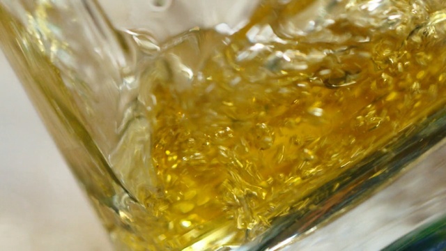 Video Reference: Yellow, Vegetable oil, Cottonseed oil, Drink, Chrysanthemum tea, Rice bran oil, Cooking oil, Oil, Food, Glass