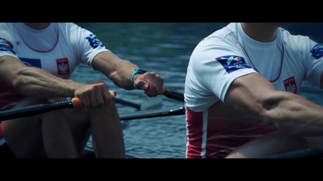 Video Reference: Recreation, Boating, Vehicle, Boats and boating--equipment and supplies, Fishing, Recreational fishing, Person, Water, Outdoor, Man, Rowing, Player, Holding, Riding, Bat, Baseball, Uniform, People, Wearing, Board, Swinging, Ball, Woman, Playing, Standing, Boat, Field, White, Blue, Sport, Sports uniform