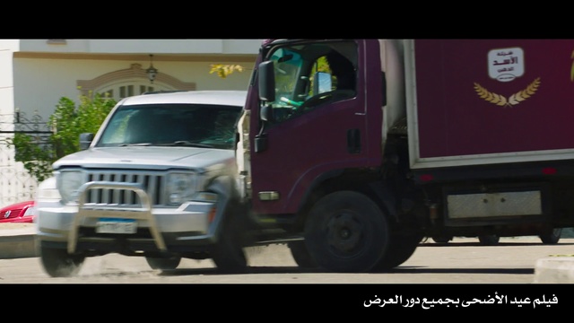 Video Reference: Land vehicle, Vehicle, Car, Transport, Mode of transport, Commercial vehicle, Jeep, Automotive tire, Truck, Jeep liberty, Road, Outdoor, Street, Driving, Small, White, Bed, Parked, Front, Sitting, Man, Riding, City, Police, Traffic, Red, Bus, Standing, Text, Wheel, Auto part, Tire