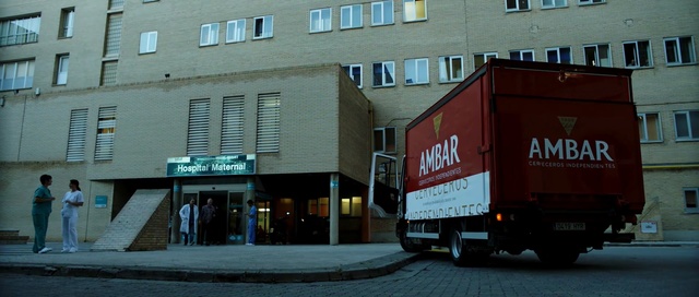 Video Reference: urban area, car, town, city, infrastructure, street, downtown, architecture, building, neighbourhood, Person