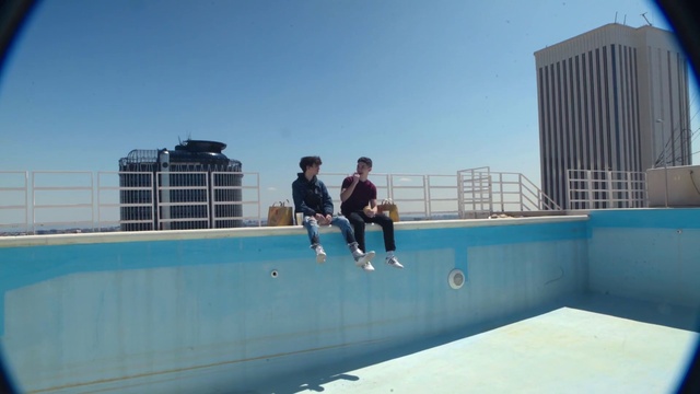 Video Reference: Blue, Leisure, Swimming pool, Recreation, Fun, Vacation, Roof, City, Sport venue, Games