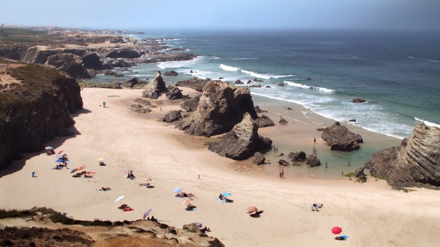 Video Reference: coast, beach, body of water, coastal and oceanic landforms, sea, shore, rock, sand, promontory, cape