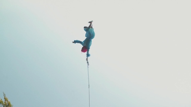 Video Reference: sky, extreme sport, adventure, jumping, recreation, cloud