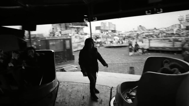 Video Reference: white, black, photograph, car, black and white, monochrome photography, mode of transport, photography, infrastructure, light, Person