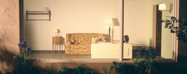 Video Reference: room, home, furniture, interior design, table, window, house, flooring, floor, Person