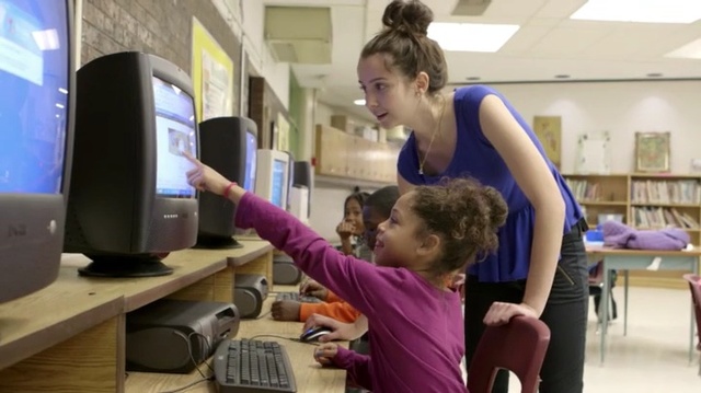 Video Reference: Child, Learning, Shoulder, Technology, Room, Electronic device, Computer, Classroom, Electronics, Person