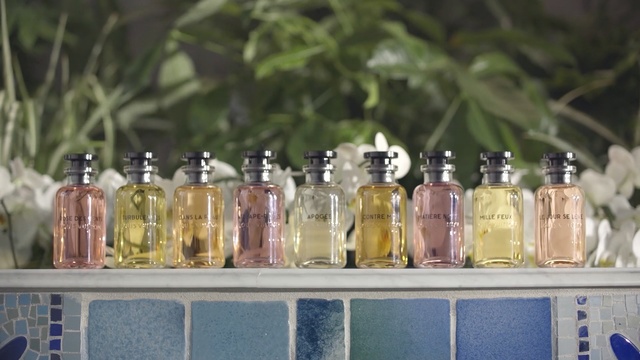 Video Reference: bottle, glass bottle, product, drinkware, plastic bottle, mason jar, product, glass, distilled beverage, Person