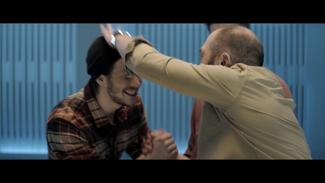 Video Reference: Arm, Human, Shoulder, Human body, Tattoo, Scene, Ear, Fictional character, Movie