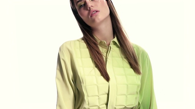 Video Reference: Hair, Clothing, Outerwear, Yellow, Hairstyle, Neck, Long hair, Jacket, Sleeve, Shoulder