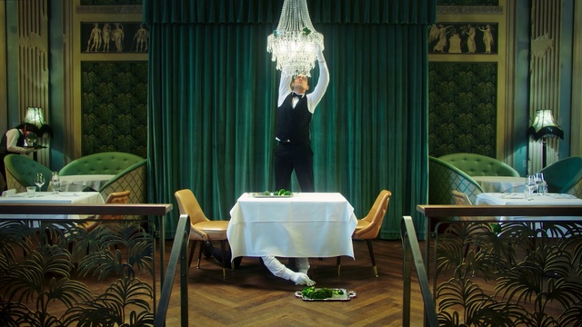 Video Reference: Green, Room, Furniture, Interior design, Table, Tablecloth, Restaurant, Person