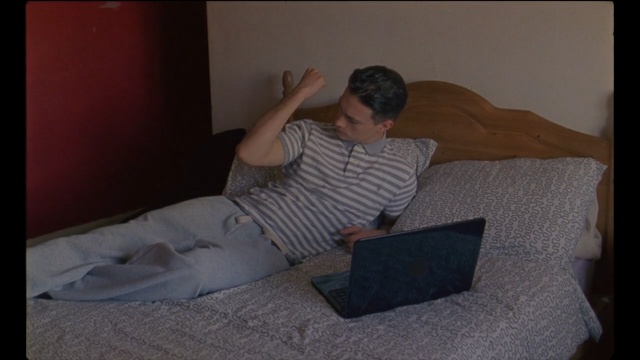 Video Reference: sitting, leg, human body, muscle, floor, arm, flooring, mouth, furniture, couch, Person