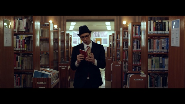 Video Reference: screenshot, library, gentleman, conversation, darkness, midnight, film, librarian