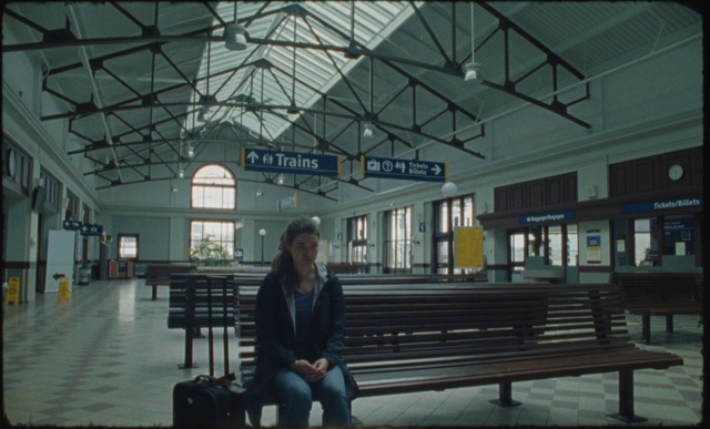 Video Reference: Furniture, Window, Building, Interior design, Outdoor bench, Bench, Luggage and bags, Bag, City, Symmetry