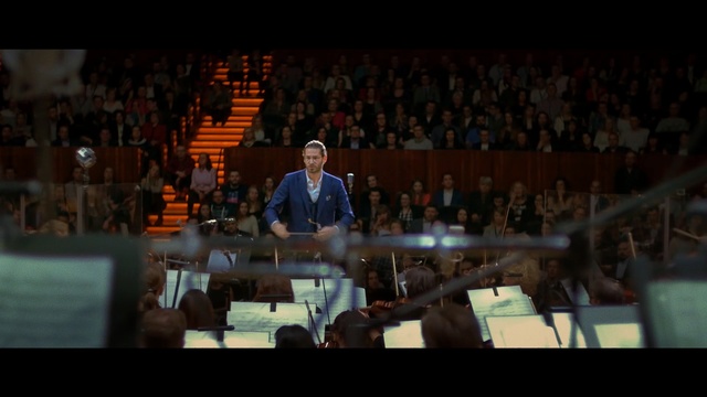 Video Reference: Audience, People, Crowd, Music, Auditorium, Stage, Screenshot, Performance, Darkness, Person