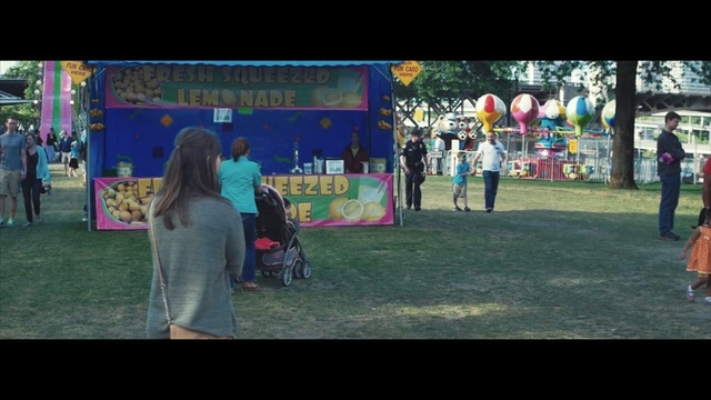 Video Reference: green, public space, day, community, fun, crowd, games, recreation, grass, event, Person