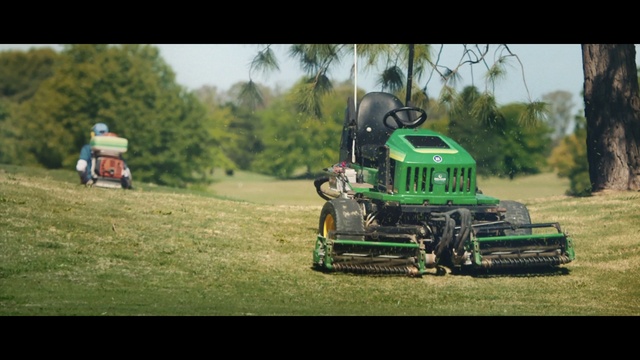Video Reference: Vehicle, Mower, Grass, Lawn, Grassland, Farm, Rural area, Field, Outdoor power equipment, Tractor