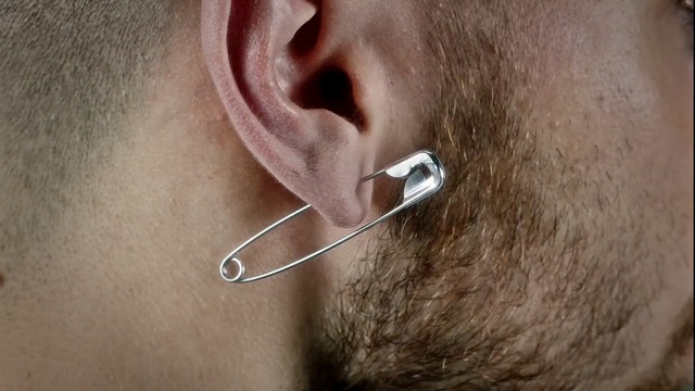 Video Reference: ear, nose, chin, facial hair, close up, cheek, neck, mouth, jaw, earrings