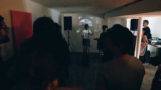 Video Reference: event, design, darkness, audio, art exhibition, art, fun, communication, exhibition, crowd, Person