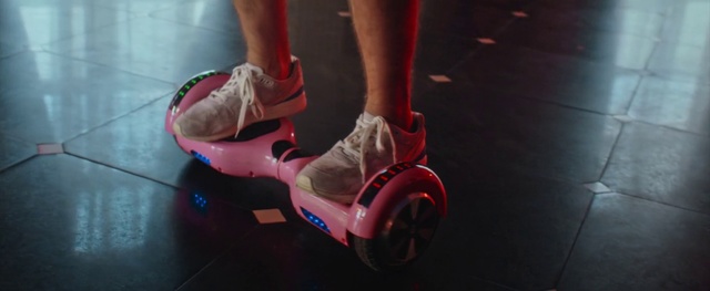 Video Reference: Footwear, Red, Kick scooter, Leg, Human leg, Shoe, Arm, Foot, Vehicle, Ankle, Person, Shoes, Indoor, Feet, Riding, Small, Young, Little, Holding, Child, Standing, Girl, Legs, Boy, Table, Wearing, Man, Board, Motorcycle, Dog, Playing, Suitcase, Luggage, Room, White, Floor, Sandal, High heels, Sneakers, Walking shoe, Boot, Outdoor shoe, Sock, Skate shoe, Athletic shoe, Basic pump, Running shoe