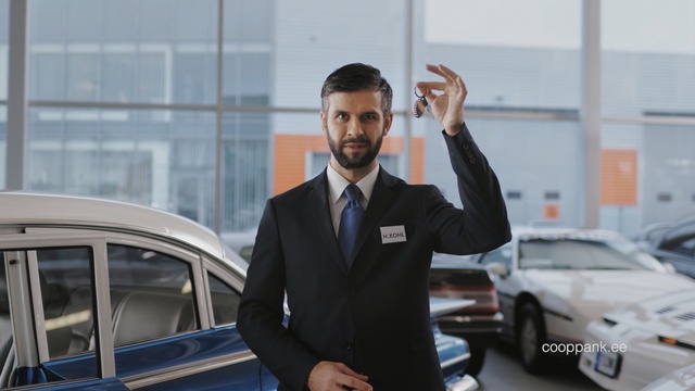 Video Reference: Luxury vehicle, Motor vehicle, Vehicle, Car, Automotive design, White-collar worker, Businessperson, Suit, Car dealership, Gentleman, Person