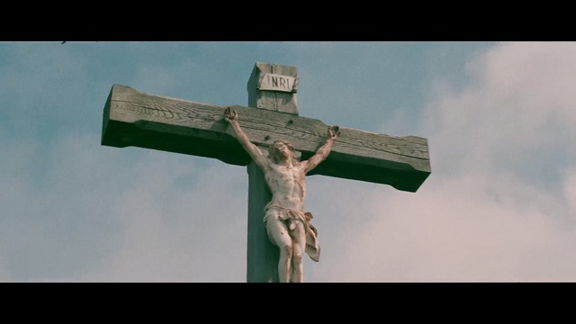 Video Reference: cross, religious item, crucifix, sky, artifact, symbol, cloud