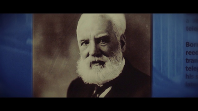 Video Reference: Moustache, Photograph, Facial hair, Portrait, Beard, Head, Forehead, Human, Chin, Art, Monitor, Screen, Indoor, Television, Photo, Man, Looking, Front, Sitting, Cat, Dark, Flat, Black, Old, Face, White, Large, Standing, Suit, Display, Blue, Text, Human face, Person, Smile, Sketch, Eyes, Jaw