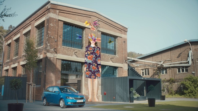 Video Reference: building, neighbourhood, luxury vehicle, car, facade, vehicle, real estate, house, commercial building, mixed use